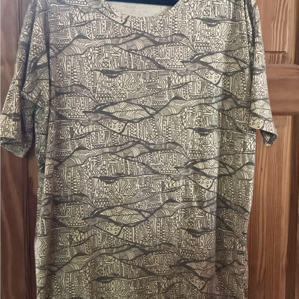 LuLaRoe Irma tunic in olive green and cream colored geometric pattern
